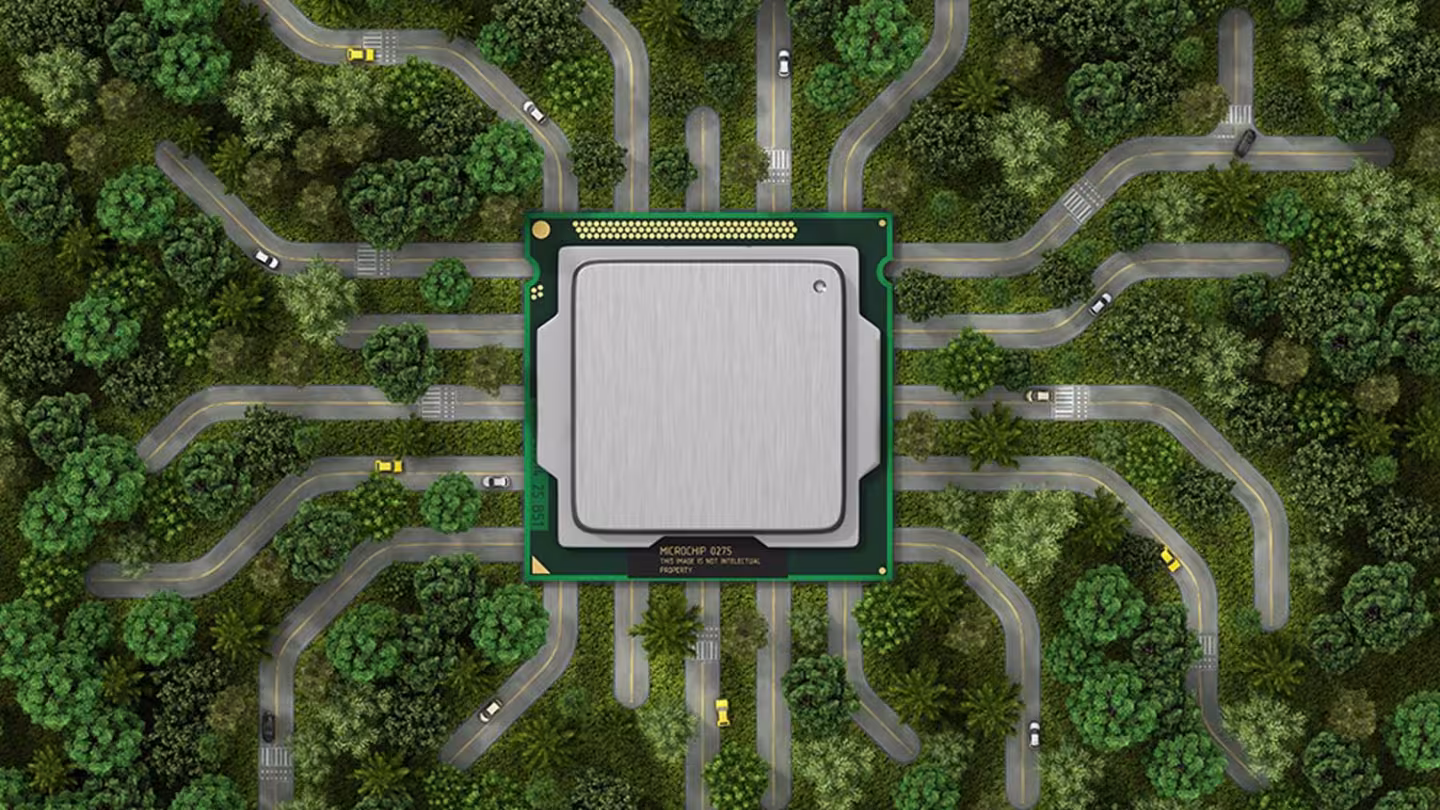 Conceptual image merging technology and nature, featuring a microchip at the heart of a forest ecosystem with road networks acting as digital pathways.