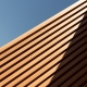line of wood in detail building and blue sky abstract architecture background