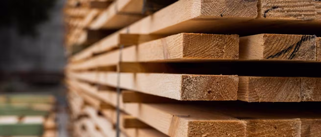 Piles of wooden boards in the sawmill