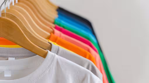 colourful t-shirts in hangers