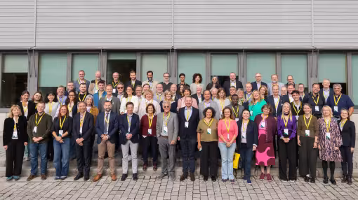 group photo of participants at the EFI Annual Conference outside the university building