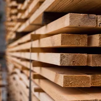 Piles of wooden boards in the sawmill
