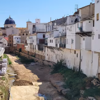 Reconstruction works in la Rambla del Poyo in Chiva, Valencia, one year after torrential rains from the 2024 DANA caused severe flooding and widespread damage.
