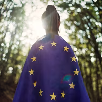 photo shows a person with EU flag
