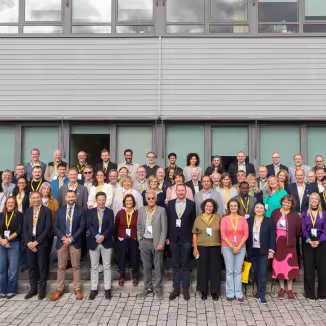 group photo of participants at the EFI Annual Conference outside the university building