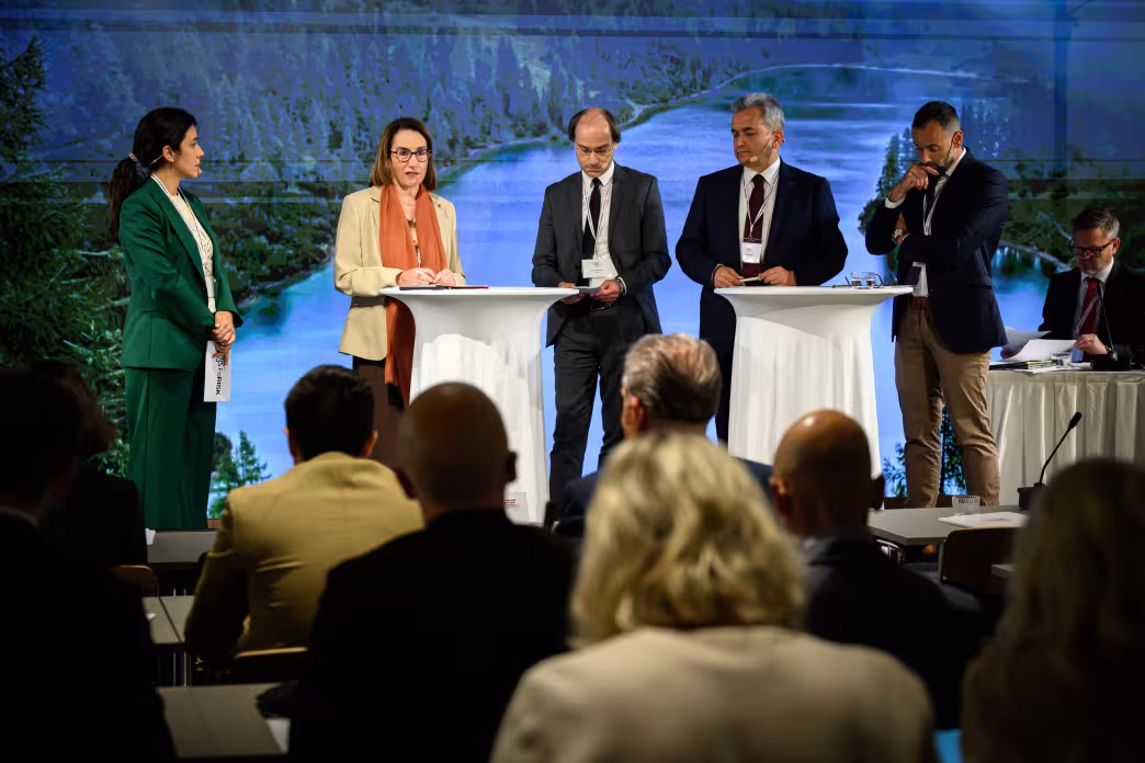 Silvia Abruscato moderating a panel discussion in the 10th FOREST EUROPE Ministerial Conference